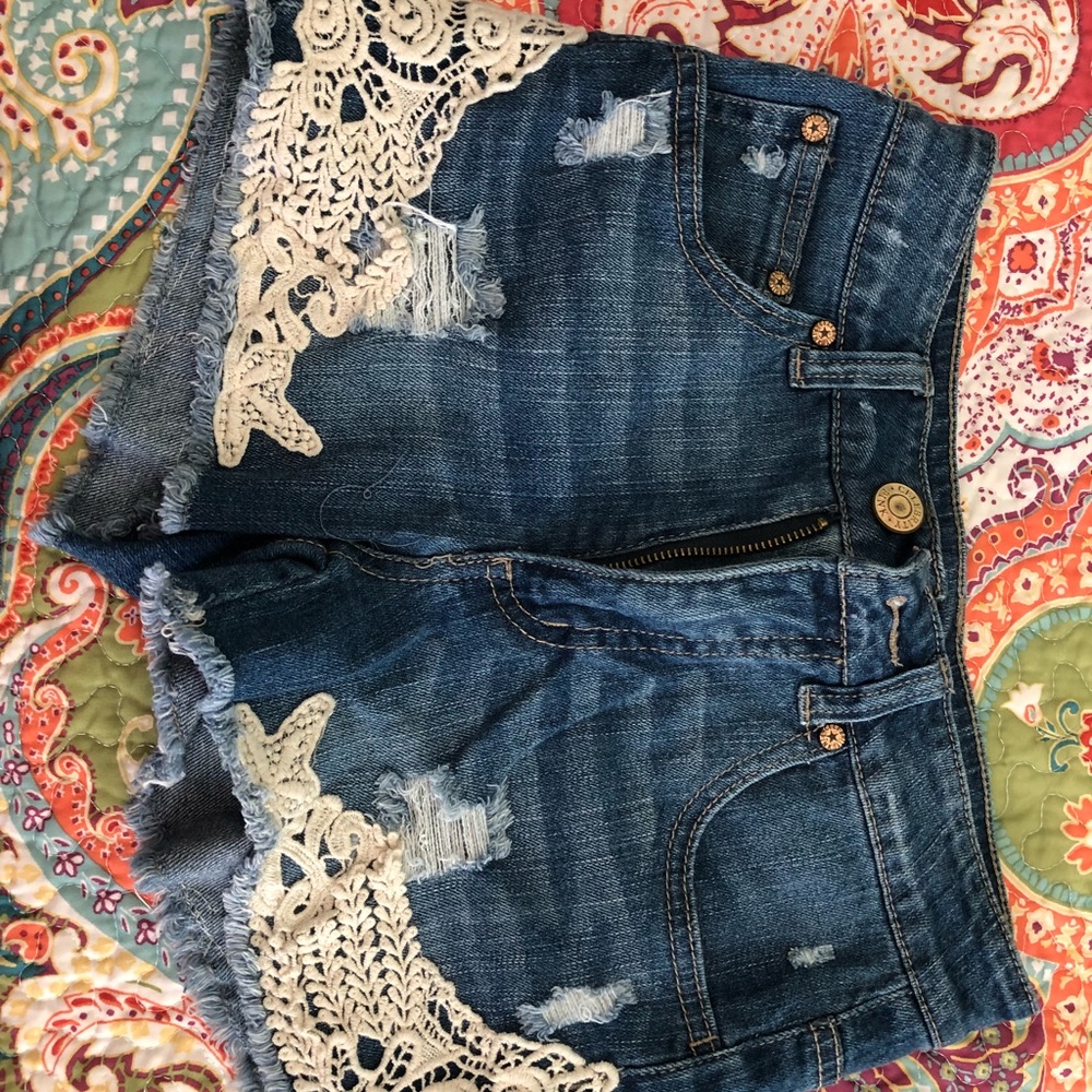 Denim shorts with detail bottoms